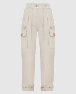 Balmain: Бежеві брюки 