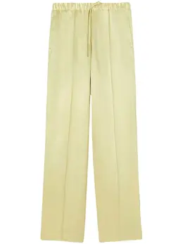 Jil Sander: Светлые брюки 