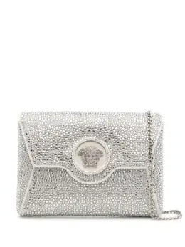 Versace: Серебристый клатч  La Medusa