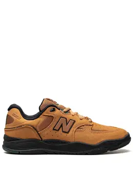 New Balance: Золотые кроссовки  1010
