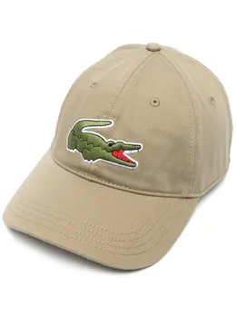 Lacoste: Бежевая кепка 