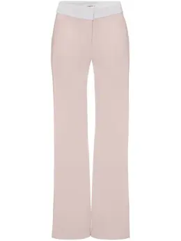 Victoria Beckham: Расклешённые брюки 