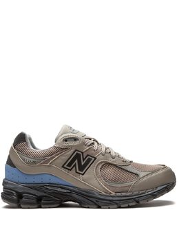 New Balance: Коричневые кроссовки 