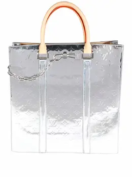 Louis Vuitton: Серебристая сумка 