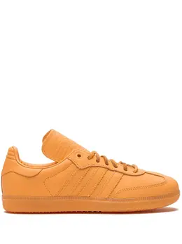 adidas: Оранжевые кроссовки  Pharrell Williams