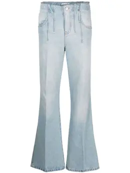 Victoria Beckham: Рваные джинсы 