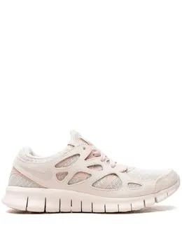 Nike: Белые кроссовки  Free Run 2