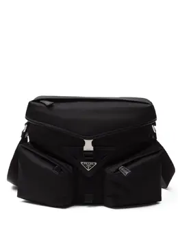 Prada: Чёрная дорожная сумка 