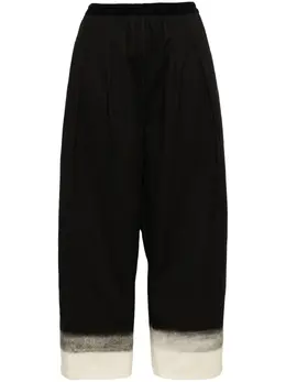 Maison Margiela: Чёрные брюки 