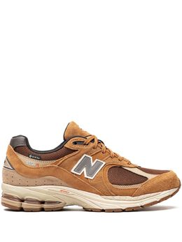 New Balance: Коричневые кроссовки 