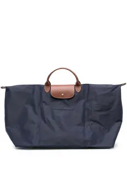 Longchamp: Синяя дорожная сумка  Le Pliage Travel