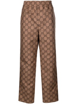 Gucci: Коричневые брюки  GG