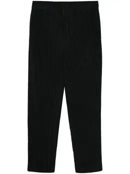 Homme Plissé Issey Miyake: Чёрные брюки 