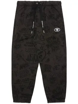 AAPE BY *A BATHING APE®: Брюки с принтом 