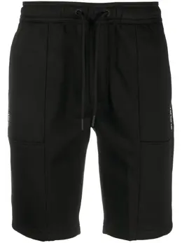 Calvin Klein Jeans: Брюки с принтом 