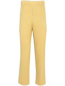 Homme Plissé Issey Miyake: Жёлтые брюки 