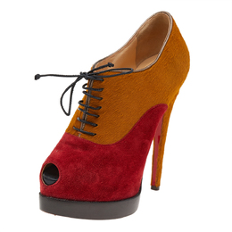 Christian Louboutin: Жёлтые ботинки 