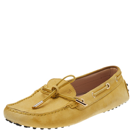 Tod's: Жёлтые мокасины  Gommino