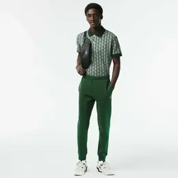 LACOSTE: Тёмные брюки 