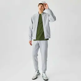 LACOSTE: Серые брюки 