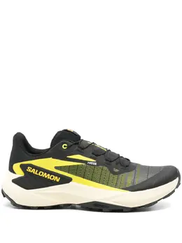 Salomon: Жёлтые кроссовки 