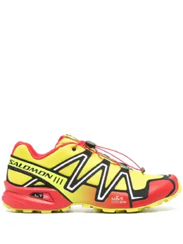 Salomon: Жёлтые кроссовки 