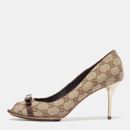 Gucci: Бежевые босоножки 