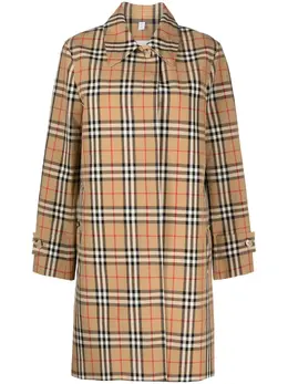 Burberry: Коричневая куртка 