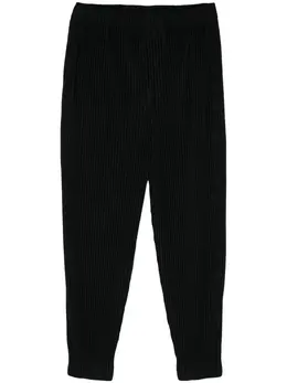 Homme Plissé Issey Miyake: Чёрные брюки 