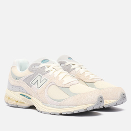 New Balance: Серые кроссовки 