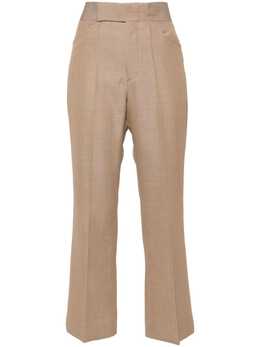 Victoria Beckham: Расклешённые брюки 