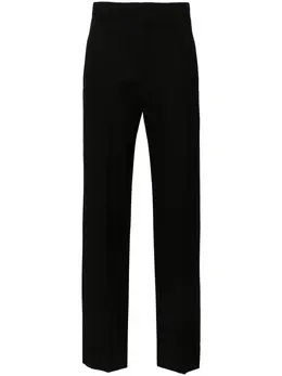 Victoria Beckham: Чёрные брюки 