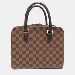 Louis Vuitton: Коричневая сумка 