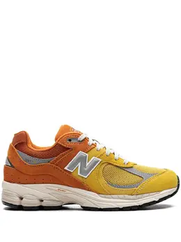 New Balance: Оранжевые кроссовки  2002R