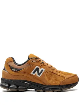 New Balance: Коричневые кроссовки 