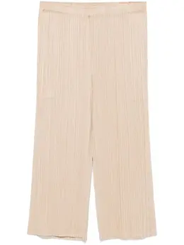 Pleats Please Issey Miyake: Бежевые брюки 