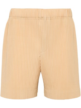 Homme Plissé Issey Miyake: Бежевые шорты 