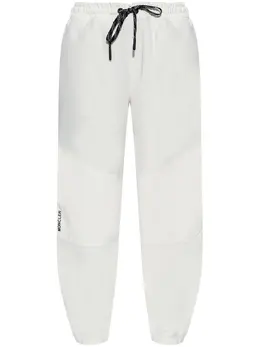 Moncler Grenoble: Бежевые брюки 