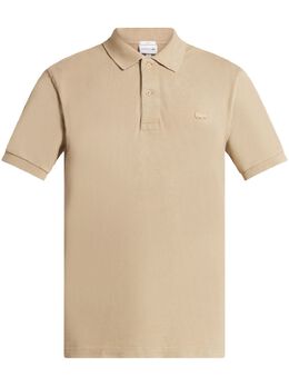 Lacoste: Бежевое поло 