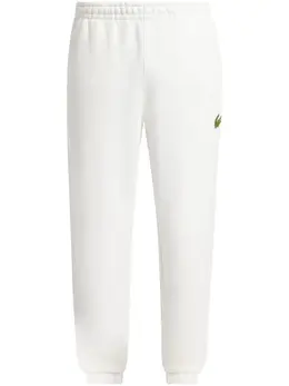 Lacoste: Белые брюки 