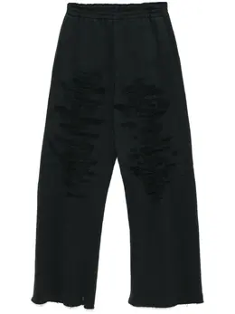 MM6 Maison Margiela: Рваные брюки 