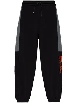 Ea7 Emporio Armani: Чёрные брюки 