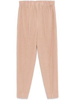 Homme Plissé Issey Miyake: Бежевые брюки 