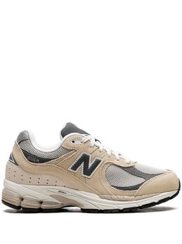 New Balance: Бежевые кроссовки  2002R