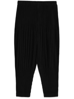 Homme Plissé Issey Miyake: Чёрные брюки 