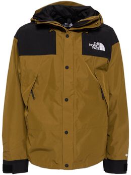 The North Face: Коричневая куртка  Mountain