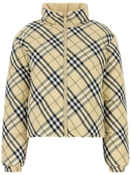 Burberry: Светлая куртка 