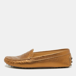 Tod's: Золотые мокасины 