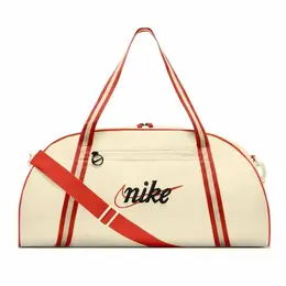 NIKE: Красная сумка 