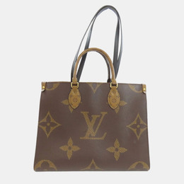 Louis Vuitton: Коричневая сумка-шоппер 